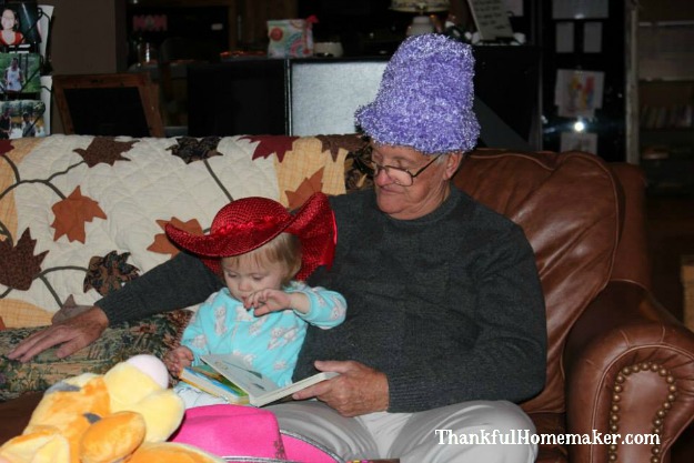 Our sweet Olivia with her Great-Grandpa. Grandpa loves those babies xoxo.