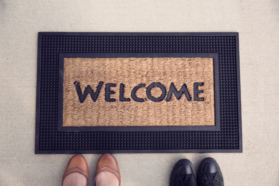A welcome doormat showing hospitality to those entering our home. 