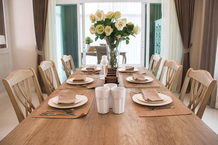 A welcoming home setting with a table prepared for guests.